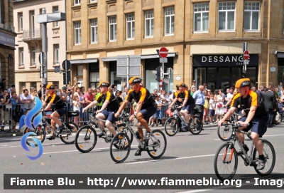 Ciclisti
Grand-Duché de Luxembourg - Großherzogtum Luxemburg - Grousherzogdem Lëtzebuerg - Lussemburgo 
Police
